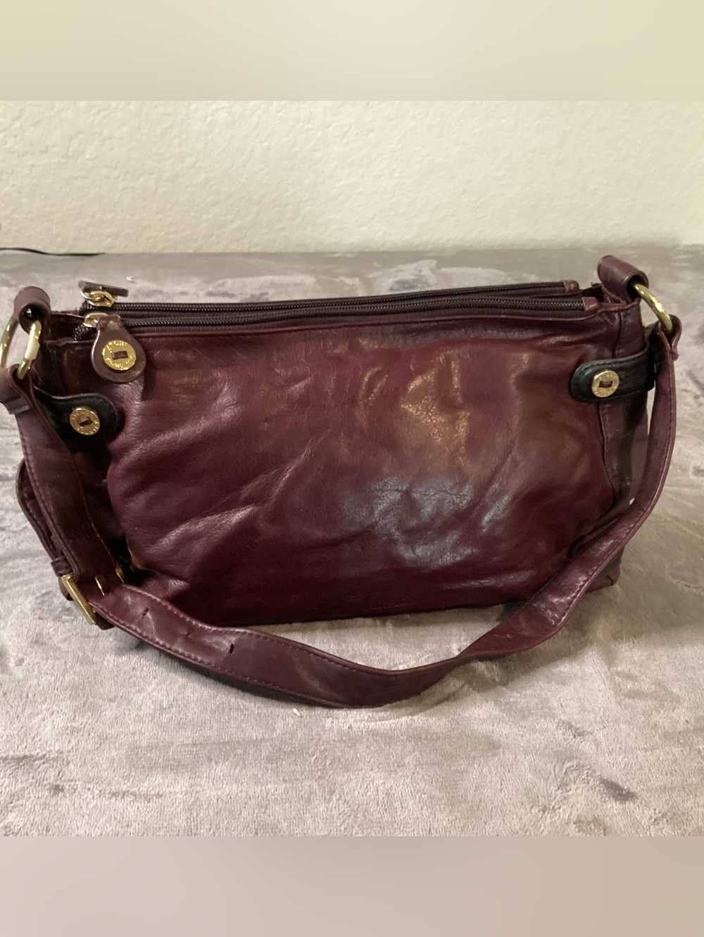 vintage Stone Mountain leather shoulder bag in a deep maroon/burgundy shade